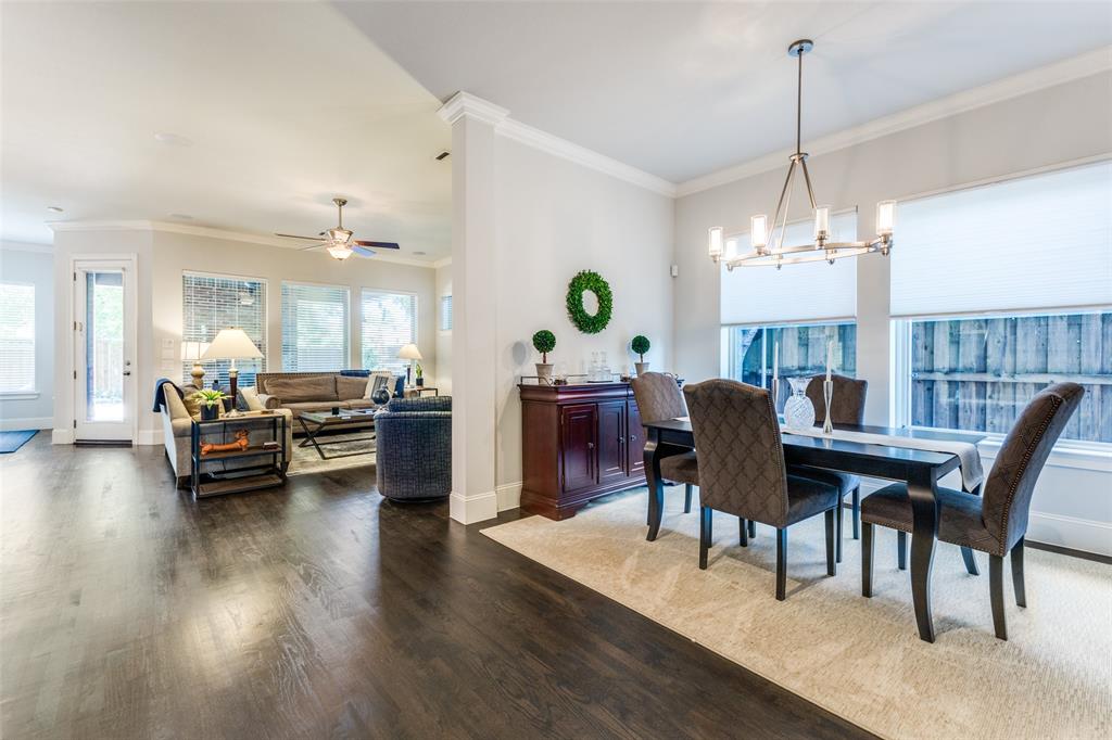 4008 North Cresthaven Road Dallas, TX 75209 - Photo 4 of 37 a view of a dining room with furniture and chandelier