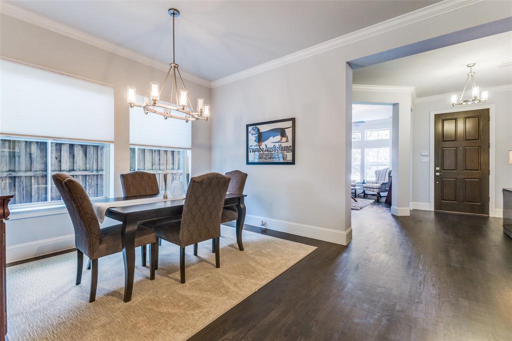 4008 North Cresthaven Road Dallas, TX 75209 - Photo 5 of 37 a view of a dining room with furniture and wooden floor