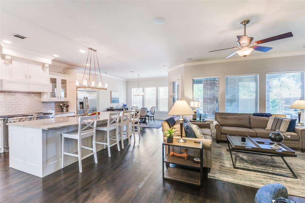 4008 North Cresthaven Road Dallas, TX 75209 - Photo 7 of 37 a living room with furniture kitchen view and a wooden floor