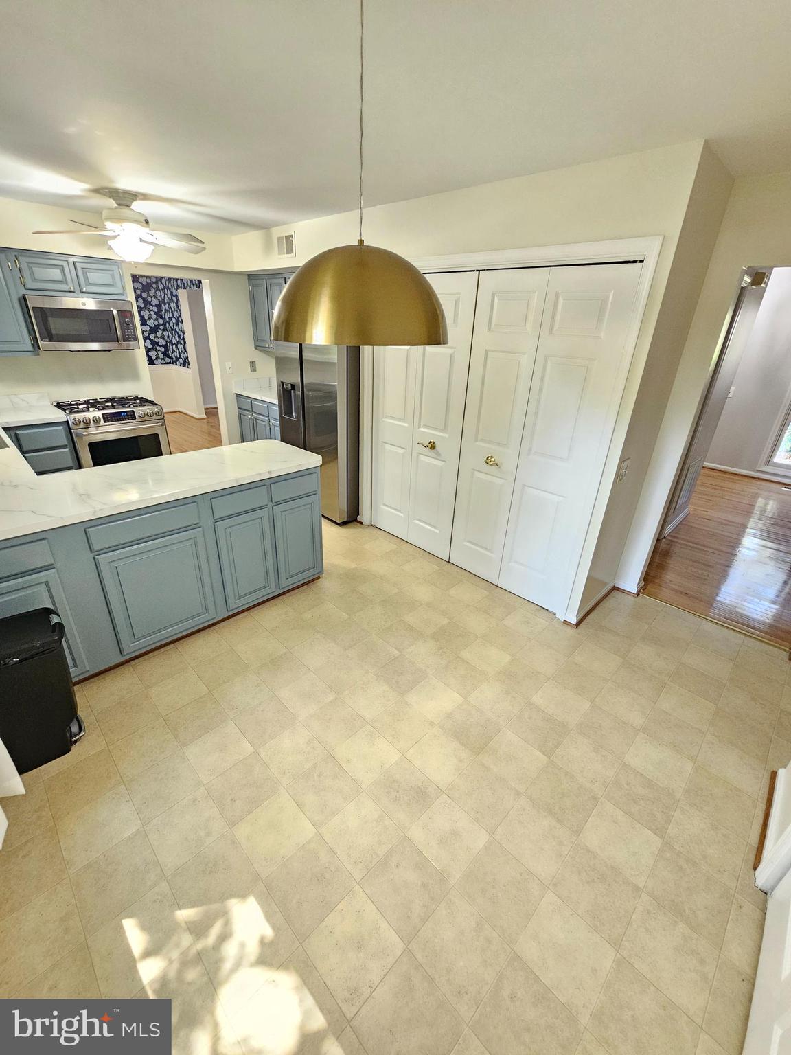11321 Classical Lane Silver Spring, MD 20901 - Photo 14 of 66 a kitchen with a sink and cabinets