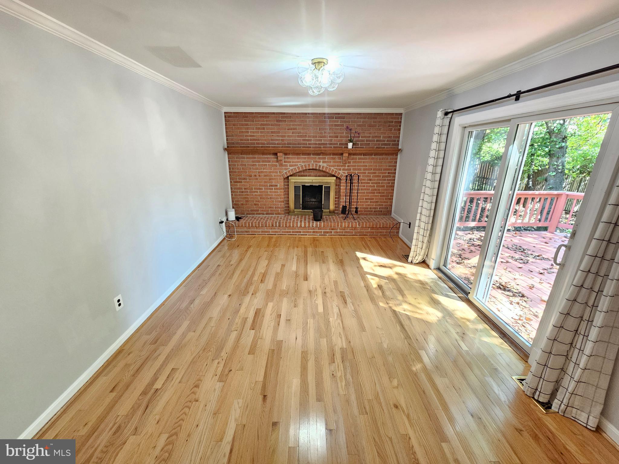11321 Classical Lane Silver Spring, MD 20901 - Photo 22 of 66 a view of a bedroom with wooden floor and front door