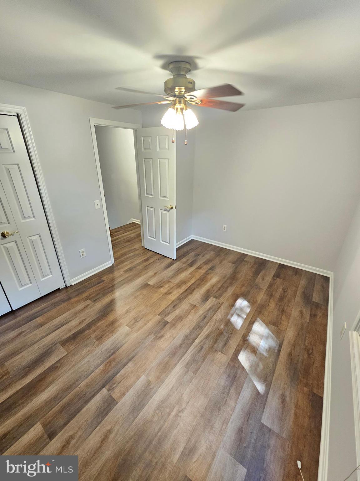 11321 Classical Lane Silver Spring, MD 20901 - Photo 32 of 66 a view of a livingroom with wooden floor