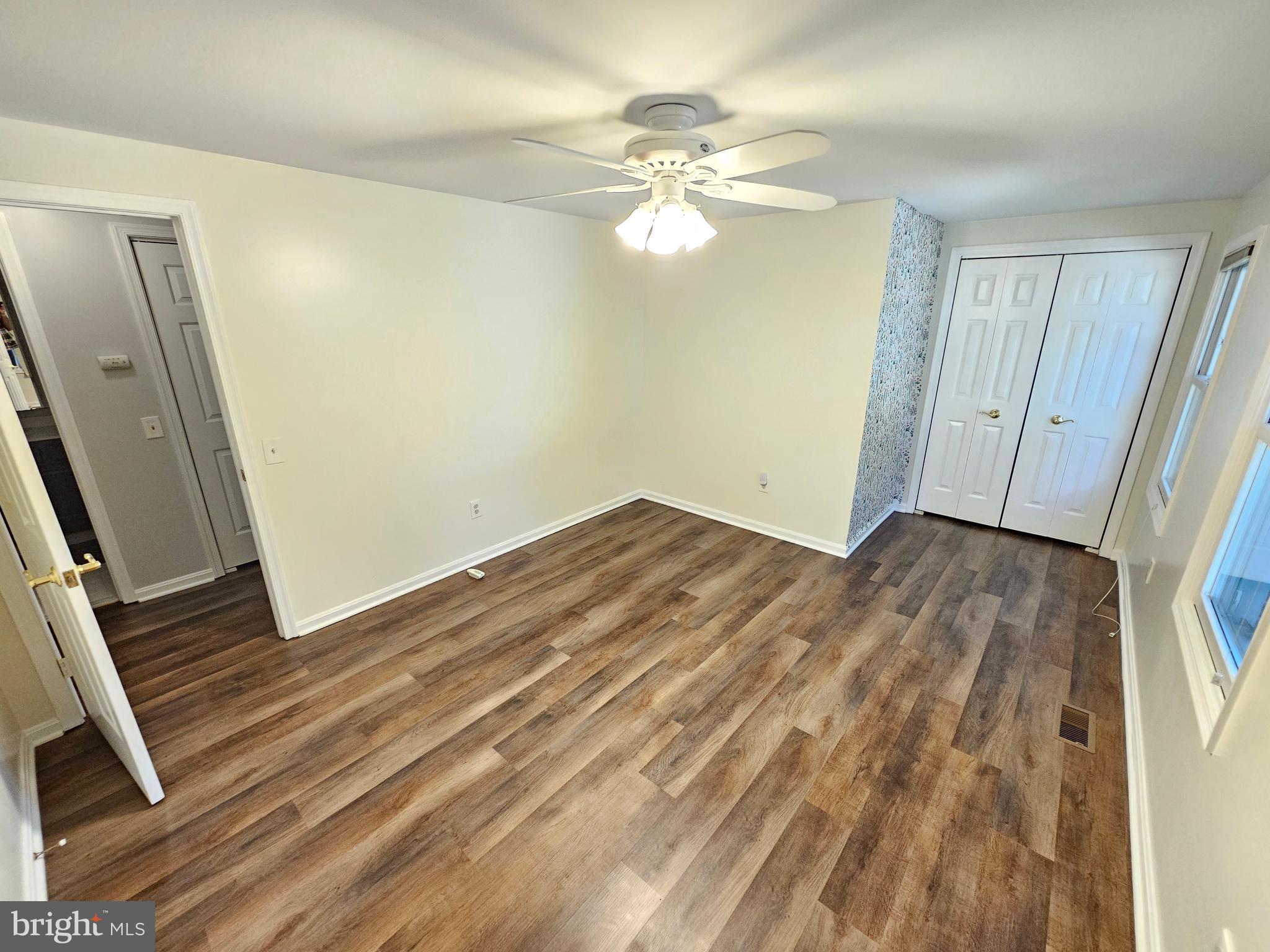 11321 Classical Lane Silver Spring, MD 20901 - Photo 37 of 66 wooden floor in an empty room