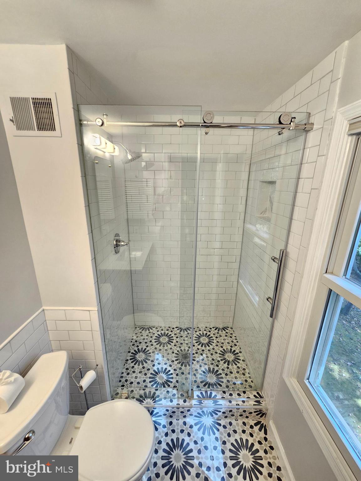 11321 Classical Lane Silver Spring, MD 20901 - Photo 47 of 66 a bathroom with a toilet and a shower