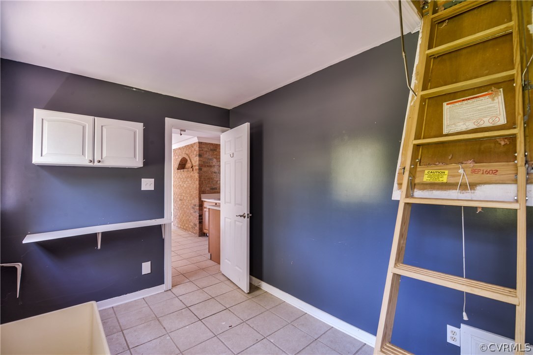 9025 Beach Road Chesterfield, VA 23838 - Photo 17 of 25 a view of walk in closet with window
