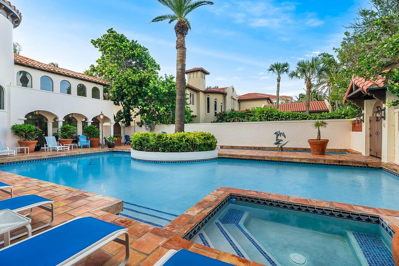 1 Ocean Lane Manalapan, FL 33462 - Photo 12 of 95 a view of a house with pool and outdoor space