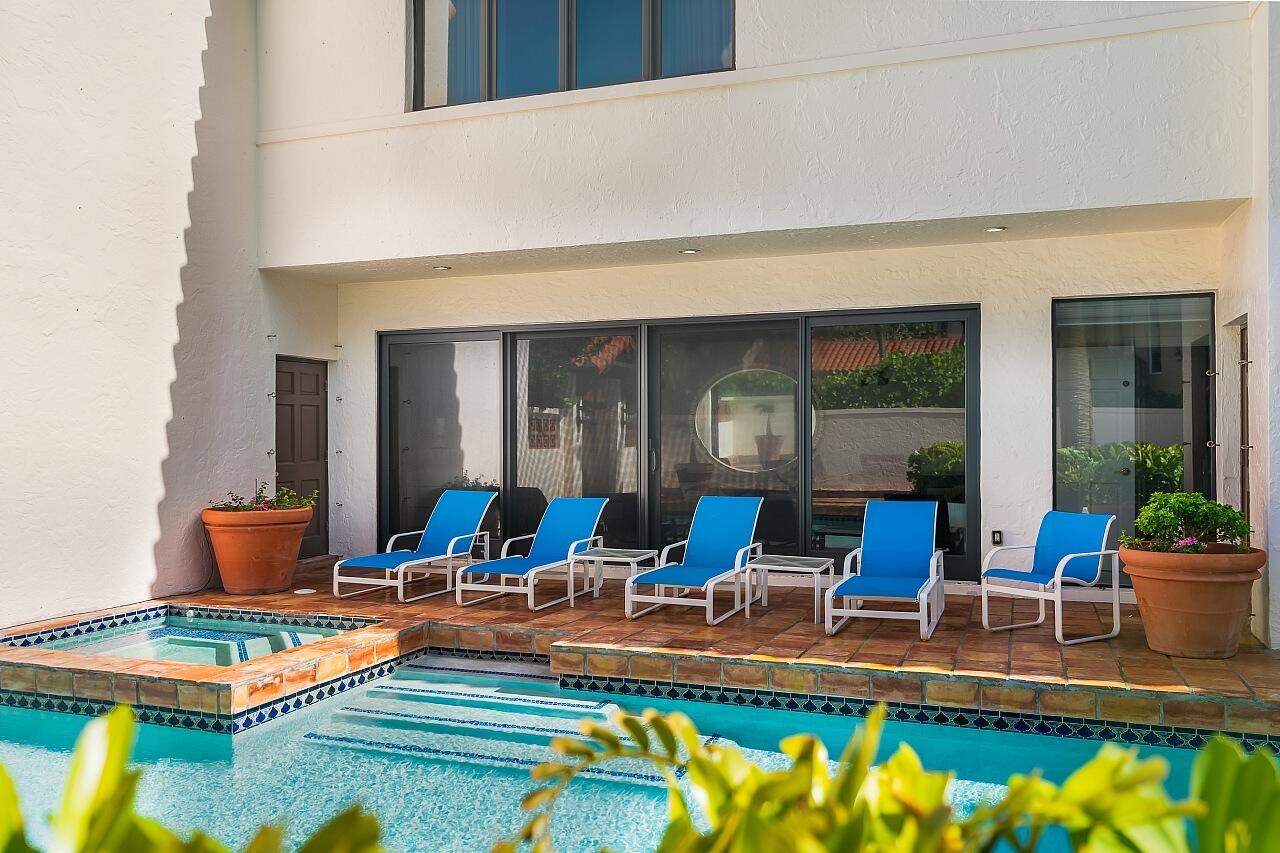 1 Ocean Lane Manalapan, FL 33462 - Photo 20 of 95 a view of swimming pool with outdoor seating