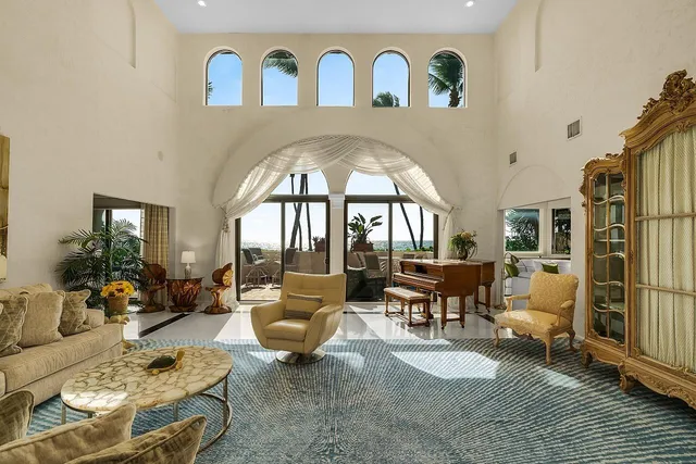 a kitchen with a stove a sink and a refrigerator