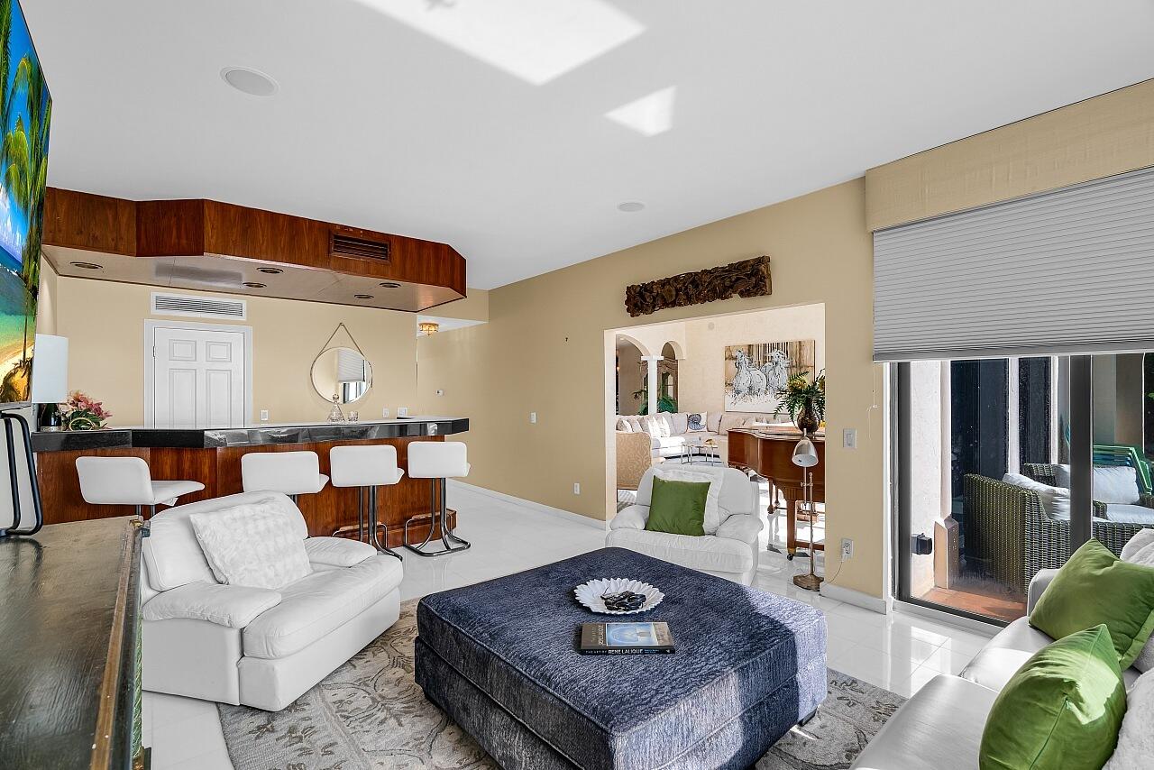 1 Ocean Lane Manalapan, FL 33462 - Photo 34 of 95 a living room with furniture and a rug