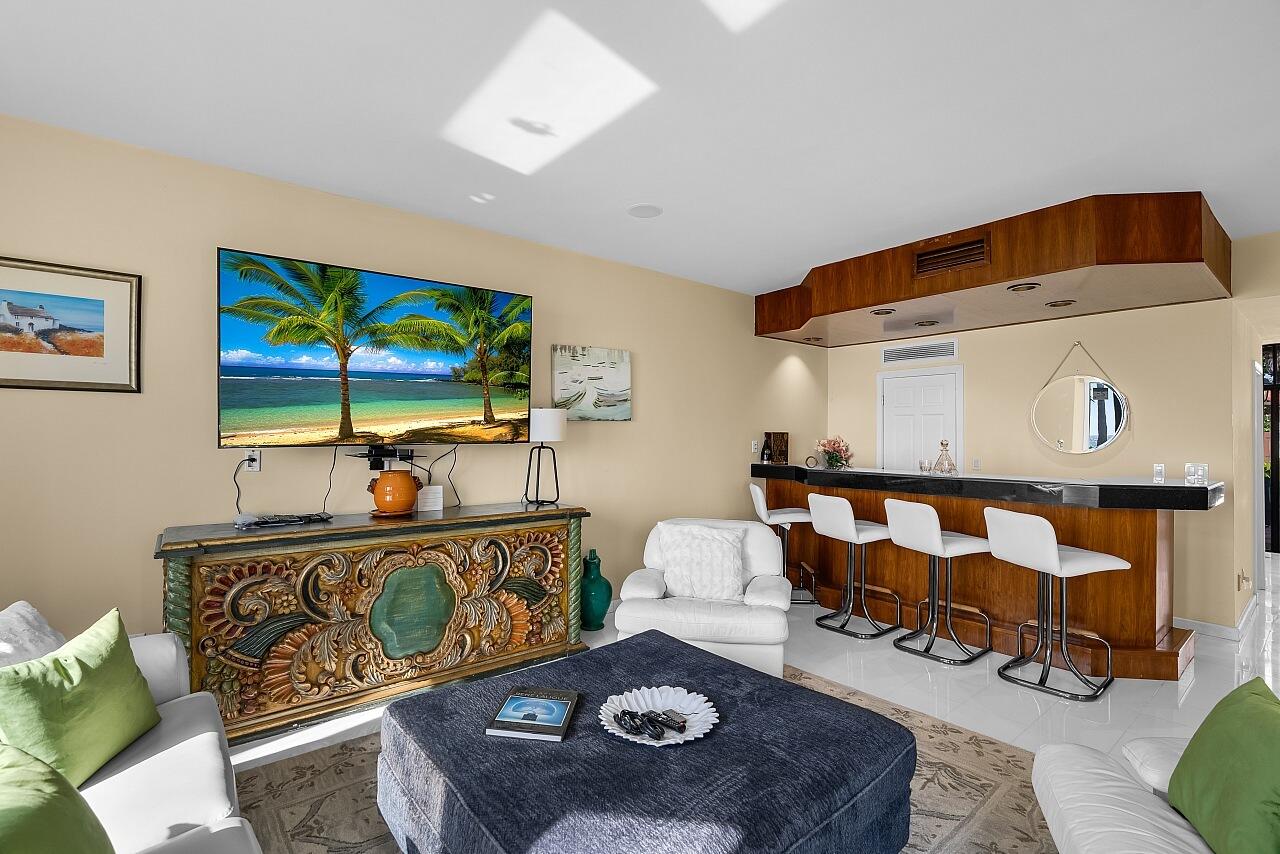 1 Ocean Lane Manalapan, FL 33462 - Photo 35 of 95 a living room with furniture and a rug