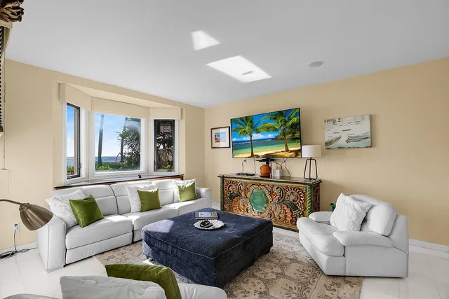 a view of a balcony with an ocean view