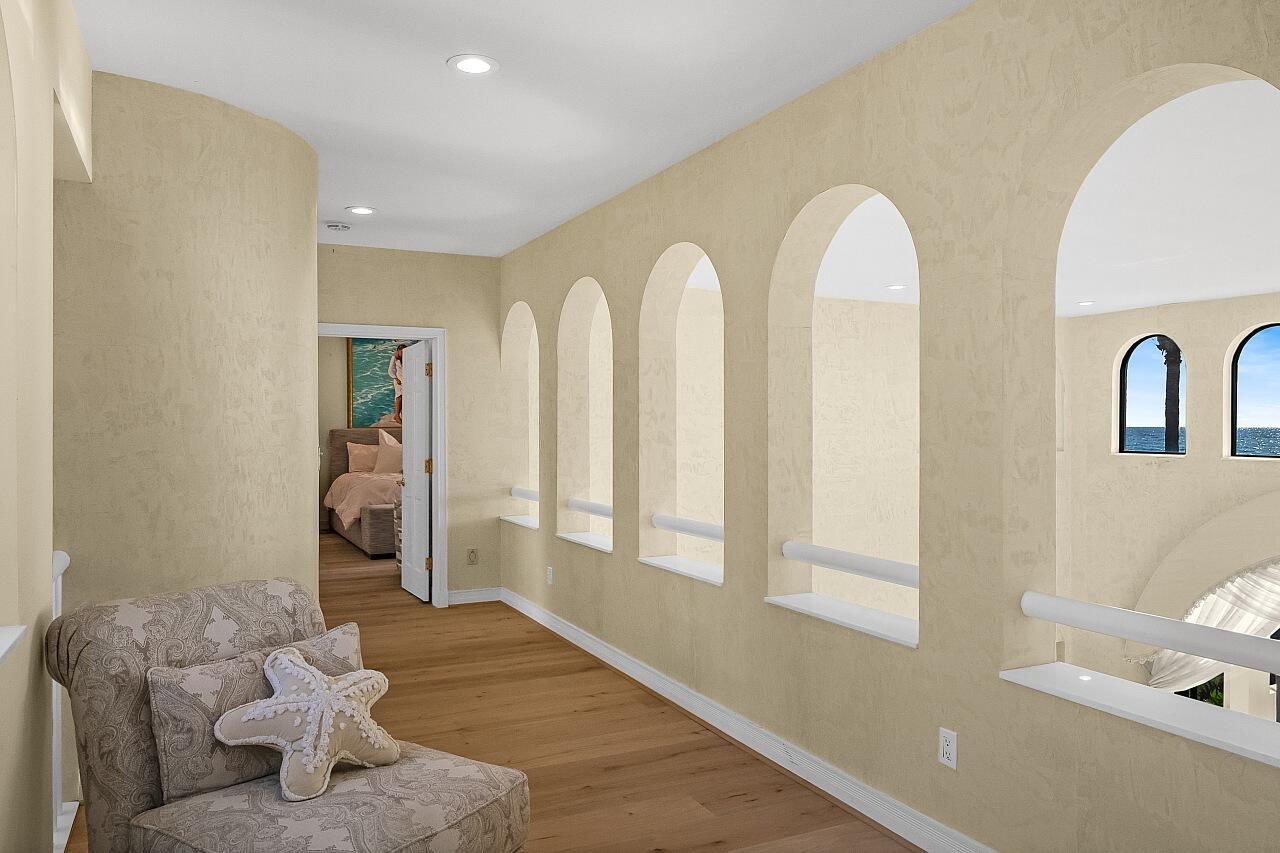 1 Ocean Lane Manalapan, FL 33462 - Photo 70 of 95 a living room with furniture and wooden floor