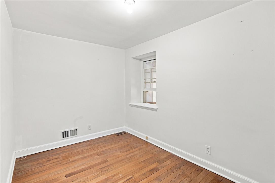 3408 Oak Hill Road Emmaus, PA 18049 - Photo 48 of 93 Rich hardwood flooring complements the clean, neutral walls in this versatile room.