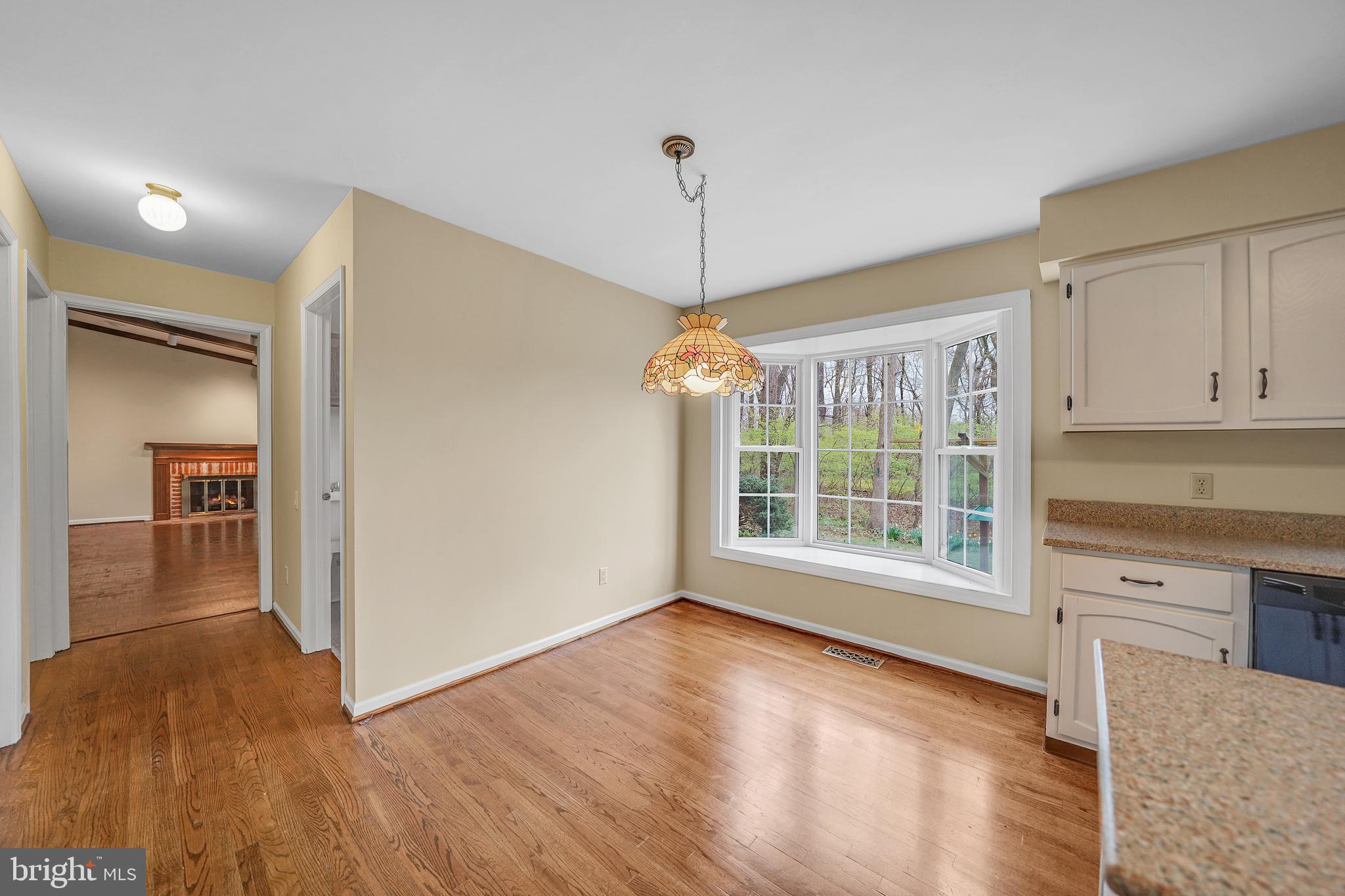 824 Meadowview Road Kennett Square, PA 19348 - Photo 12 of 39 Breakfast area and kitchen have wood floors