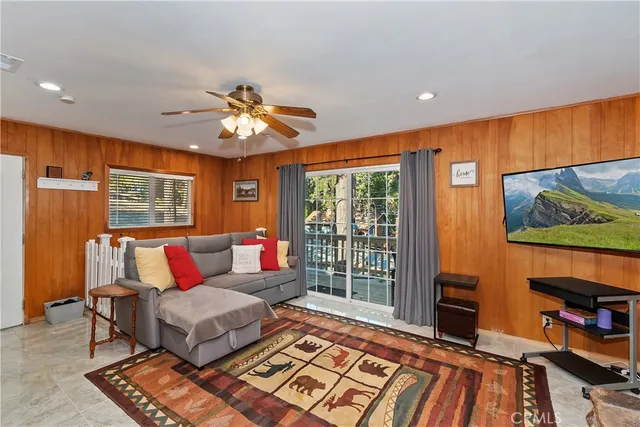 a view of a balcony with a tree