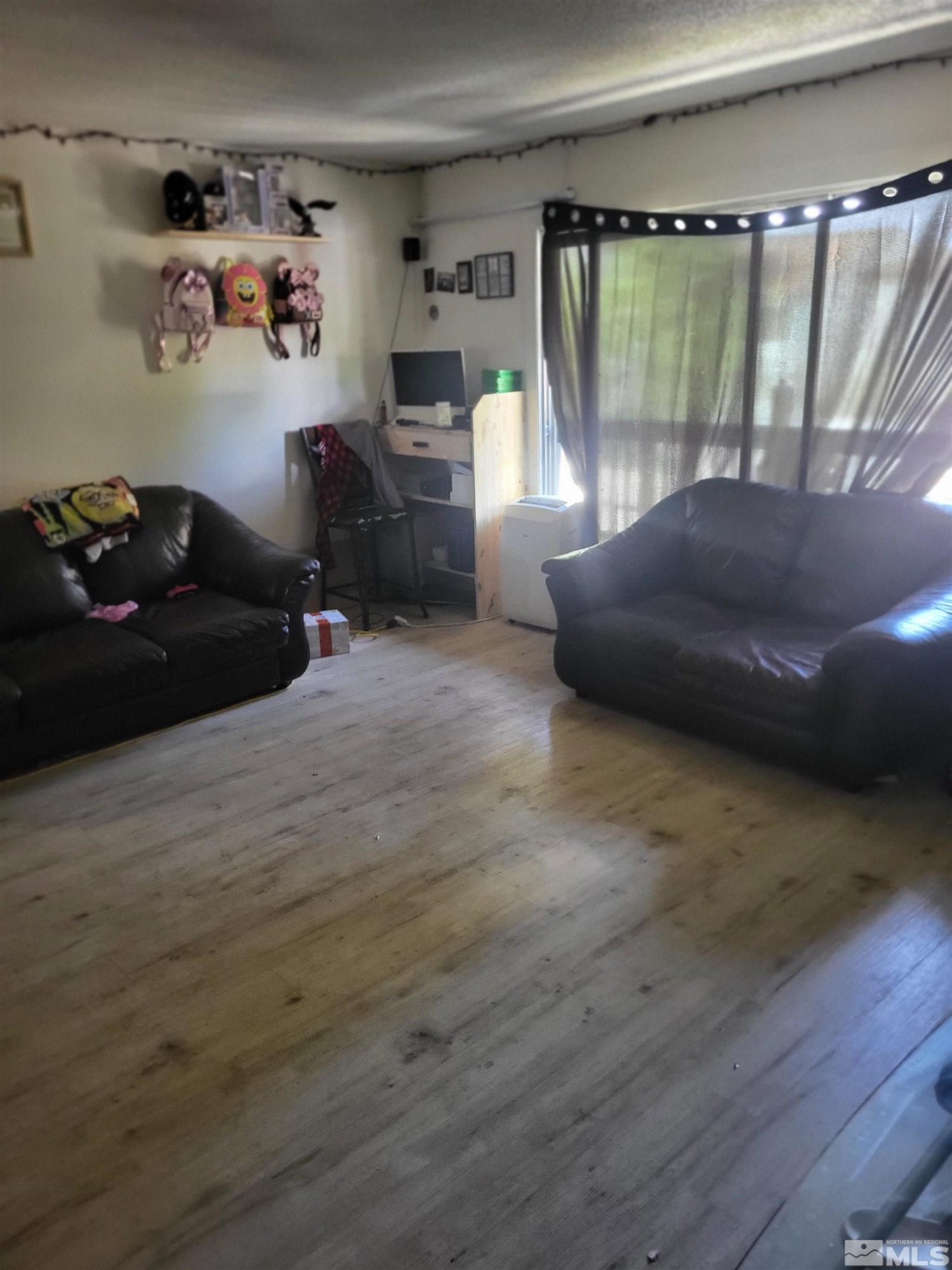3590 Carlos Lane Reno, NV 89502 - Photo 5 of 11 a bedroom with a bed window and a chair