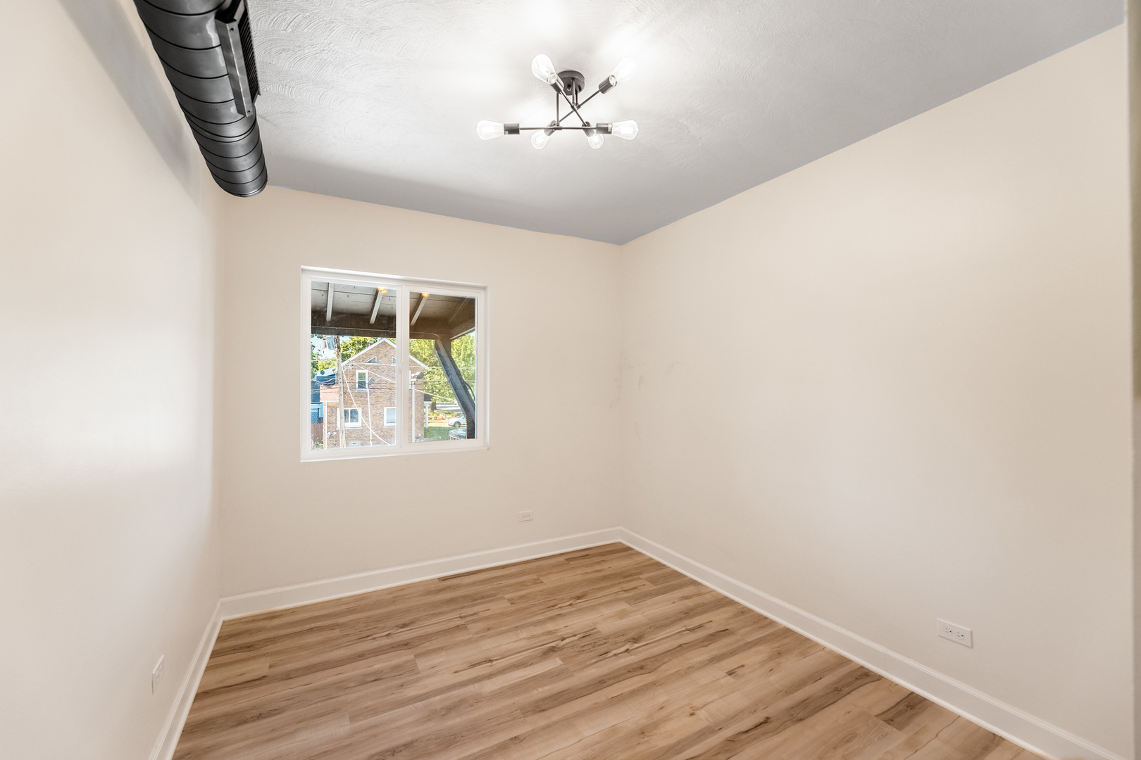 3243 Ridge Road, Unit 2 Lansing, IL 60438 - Photo 11 of 13 an empty room with windows