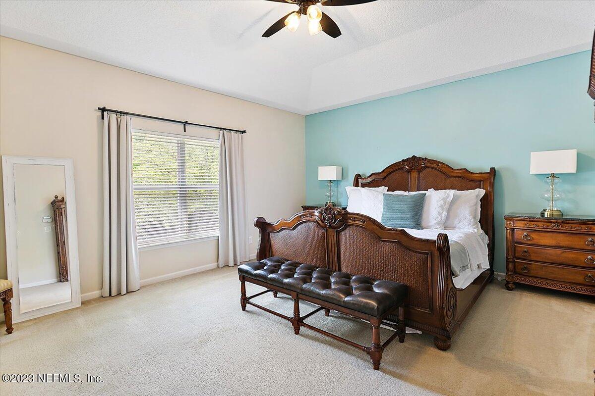 776 Constitution Place Macclenny, FL 32063 - Photo 11 of 30 a bed room with a bed and a chair