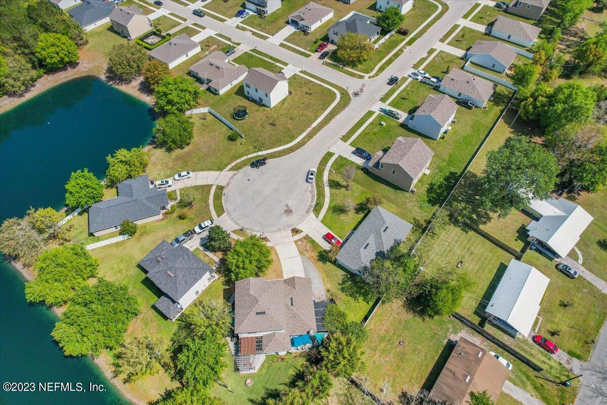 776 Constitution Place Macclenny, FL 32063 - Photo 25 of 30 an aerial view of a house with a yard and lake view