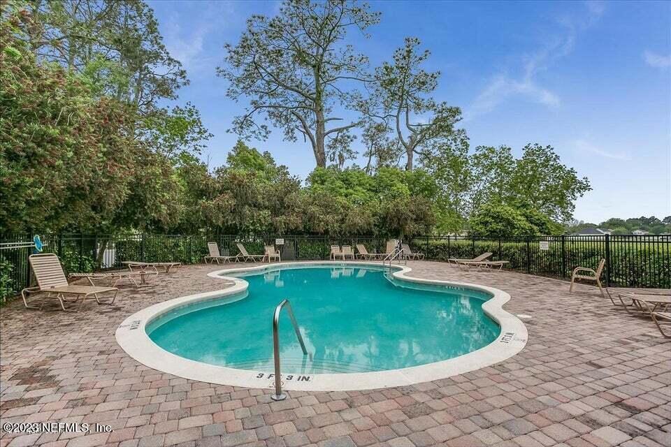 776 Constitution Place Macclenny, FL 32063 - Photo 28 of 30 a view of a swimming pool with an outdoor space