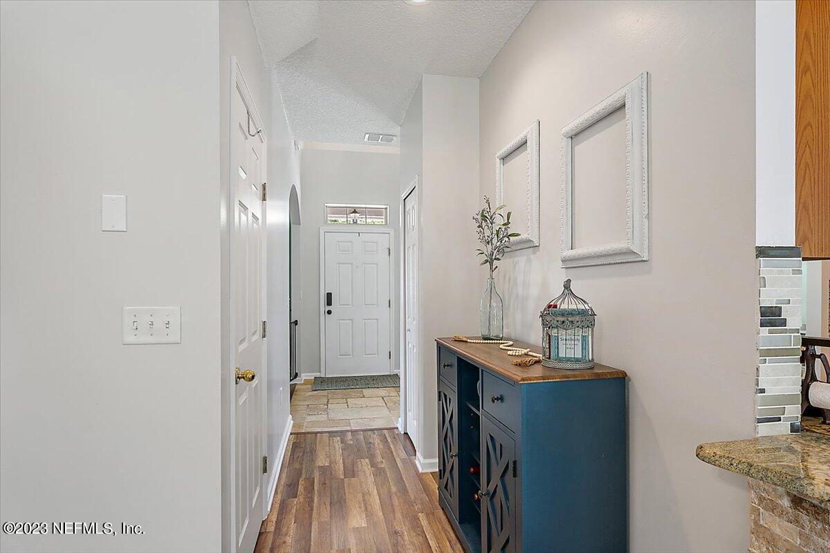 776 Constitution Place Macclenny, FL 32063 - Photo 4 of 30 a view of a kitchen from the hallway
