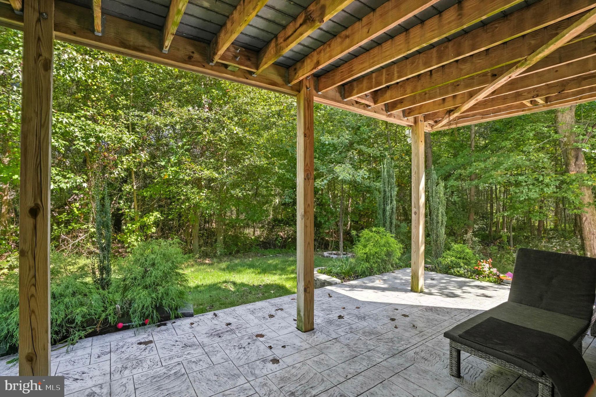 2716 Fredericksburg Road Hanover, MD 21076 - Photo 3 of 36 Stamped concrete patio w/ wooded views