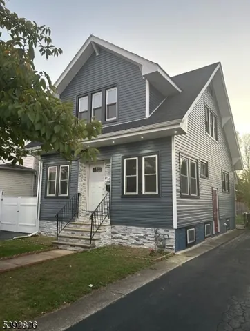 front view of house with a yard