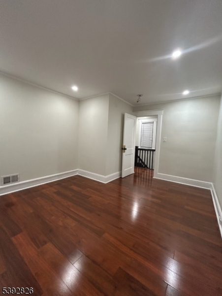 904 Cross Elizabeth, NJ 07208 - Photo 15 of 27 a view of empty room with wooden floor