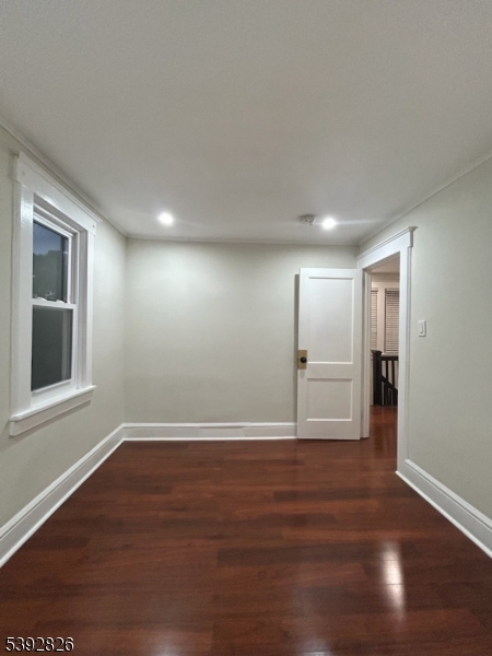 904 Cross Elizabeth, NJ 07208 - Photo 16 of 27 a view of empty room with wooden floor and fan