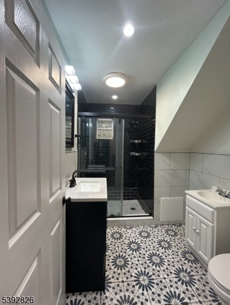 904 Cross Elizabeth, NJ 07208 - Photo 17 of 27 a bathroom with a sink toilet and shower