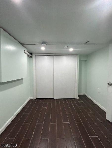 904 Cross Elizabeth, NJ 07208 - Photo 21 of 27 a view of a room with wooden floor and white walls