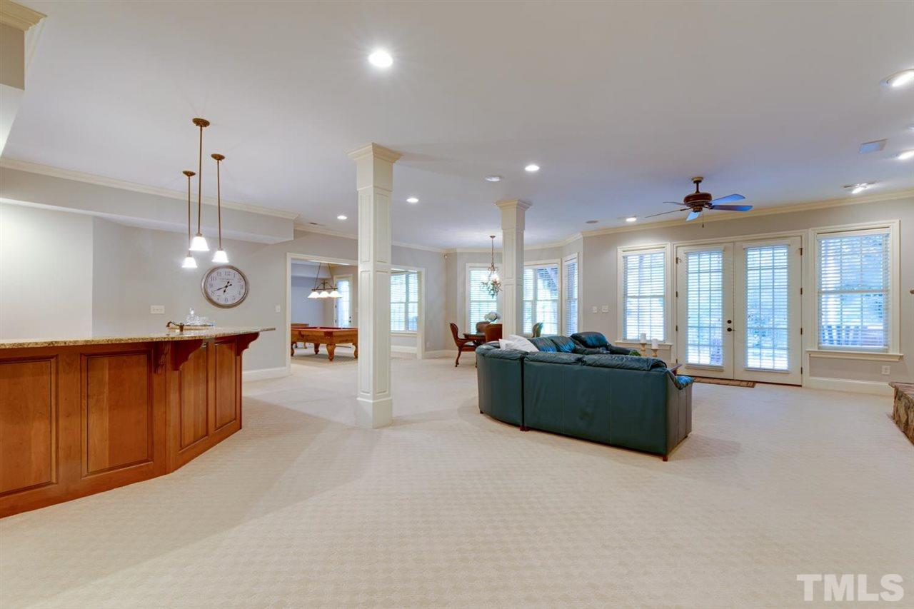 1317 Caistor Lane Raleigh, NC 27614 - Photo 22 of 22 Another view of the open floor plan in the basement rooms. So many choices for this space.