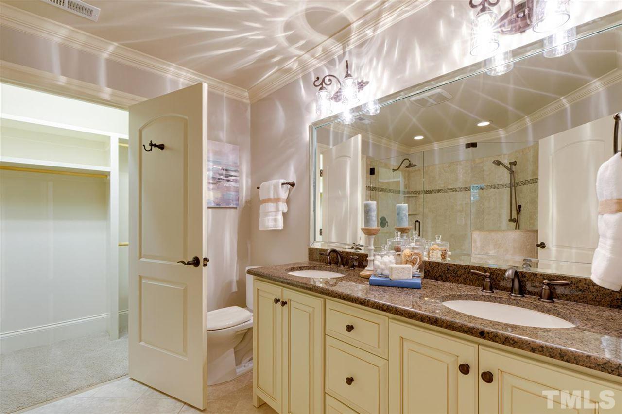 1317 Caistor Lane Raleigh, NC 27614 - Photo 15 of 22 This is the lower level-basement owners bath option. It has dual vanities, huge WALK-IN shower, and a large WALK-IN closet!