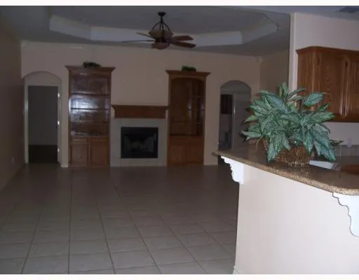 a view of hall way with furniture