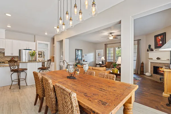 a view of a city with lush green forest