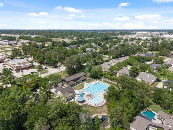 an aerial view of residential house with outdoor space