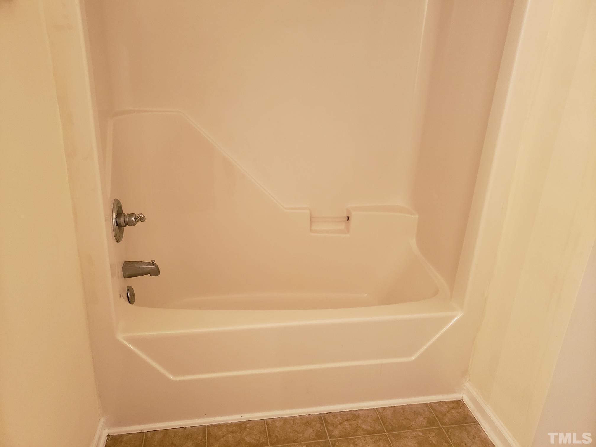 542 Barnes Lake Road, Unit B Middlesex, NC 27557 - Photo 12 of 16 a bathroom with a shower