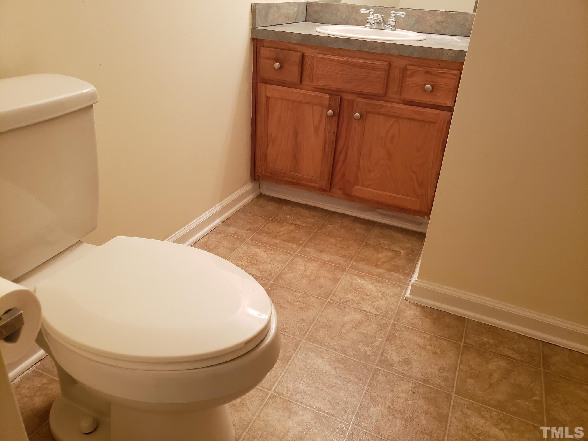 542 Barnes Lake Road, Unit B Middlesex, NC 27557 - Photo 13 of 16 a bathroom with a toilet and a sink