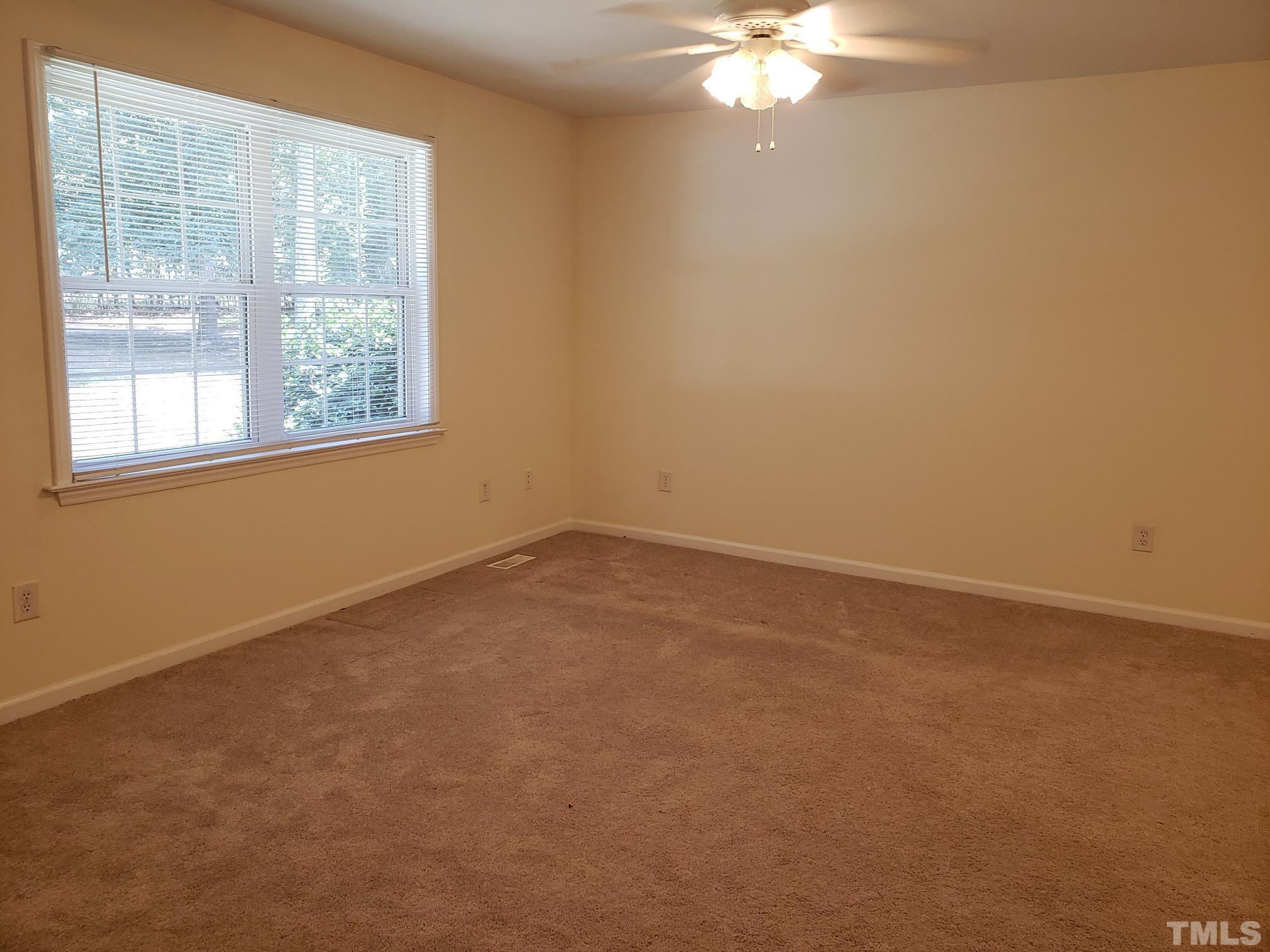 542 Barnes Lake Road, Unit B Middlesex, NC 27557 - Photo 2 of 16 an empty room with a window