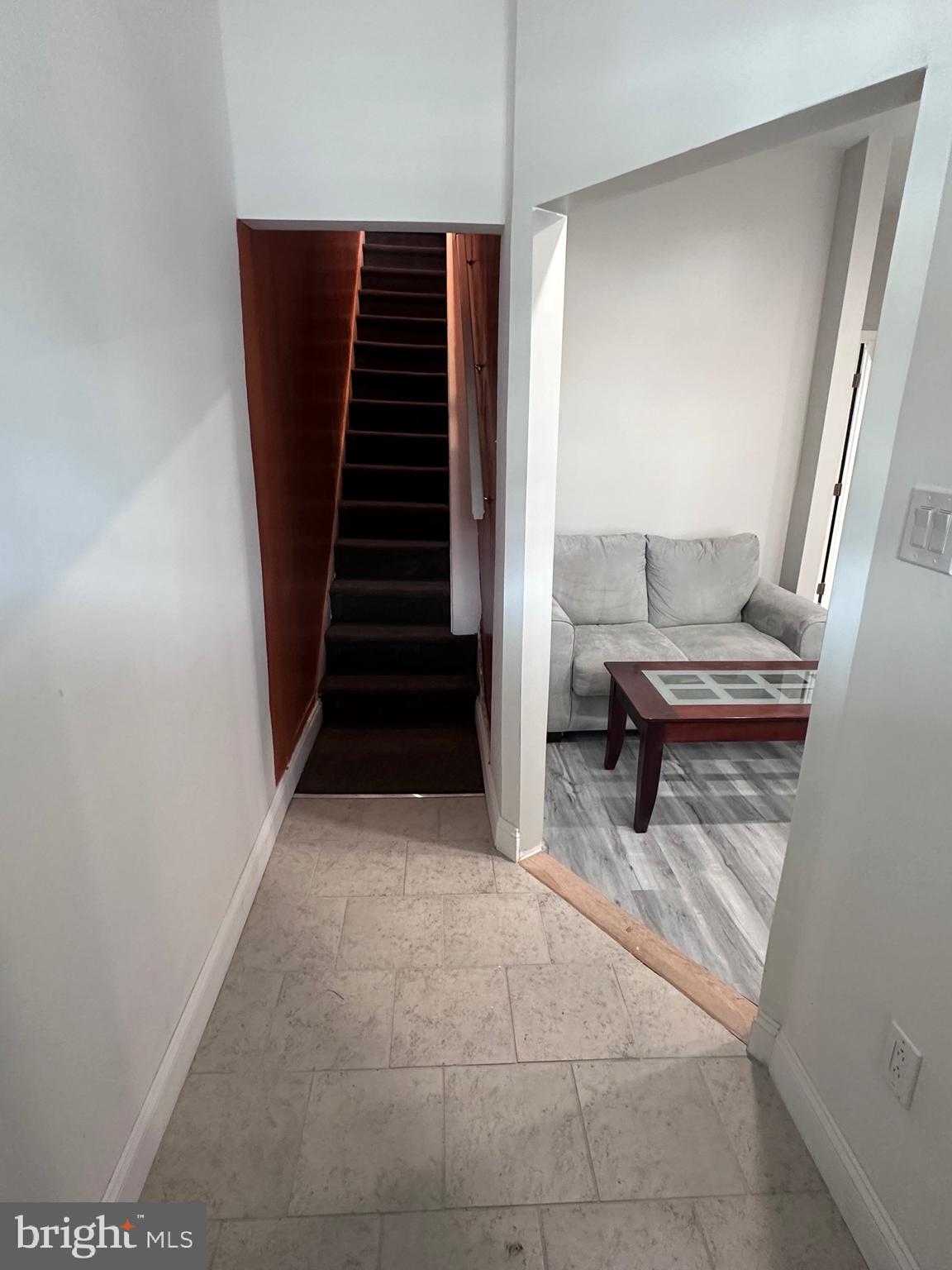 5254 Jefferson Street Philadelphia, PA 19131 - Photo 5 of 30 a view of a hallway to rooms and stairs