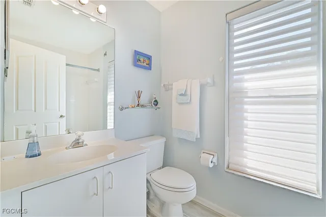 a bathroom with a shower and a bath tub