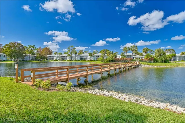 a view of a swimming pool with a lounge chairs