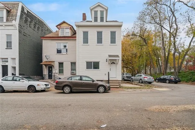 a car parked in front of a house