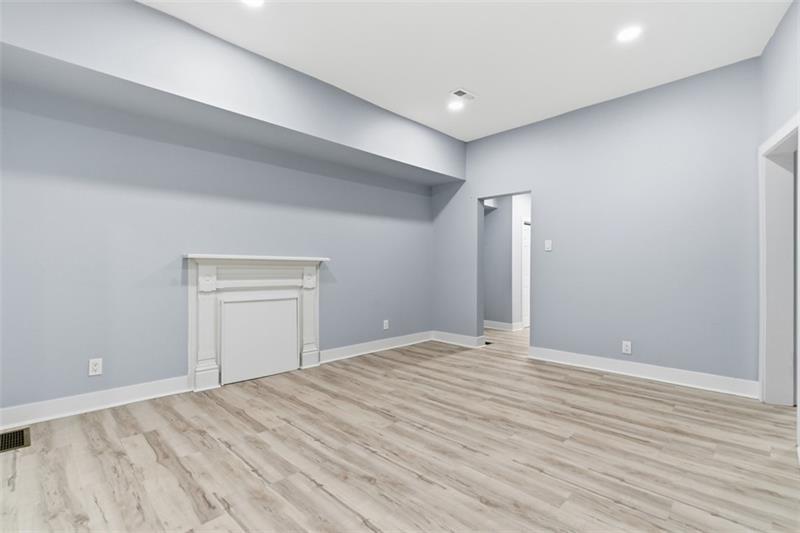 1150 Goettmann Street Pittsburgh, PA 15212 - Photo 14 of 36 a view of an empty room with wooden floor