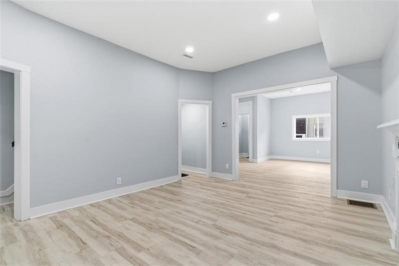 1150 Goettmann Street Pittsburgh, PA 15212 - Photo 16 of 36 a view of an empty room with wooden floor