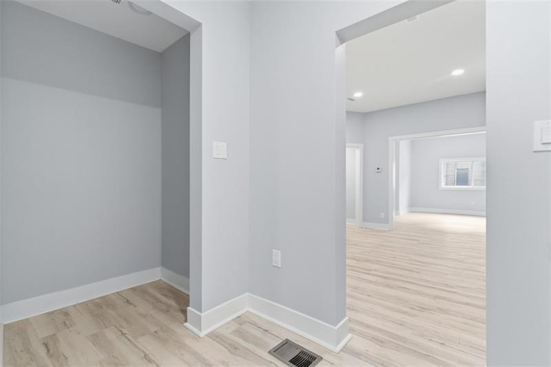 1150 Goettmann Street Pittsburgh, PA 15212 - Photo 17 of 36 a view of hallway with wooden floor