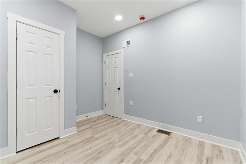 1150 Goettmann Street Pittsburgh, PA 15212 - Photo 21 of 36 wooden floor in an empty room