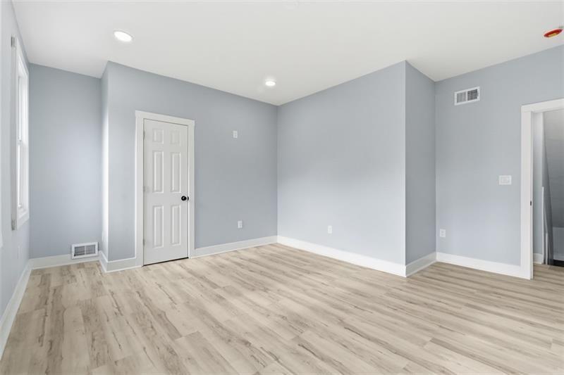 1150 Goettmann Street Pittsburgh, PA 15212 - Photo 23 of 36 a view of room with wooden floor