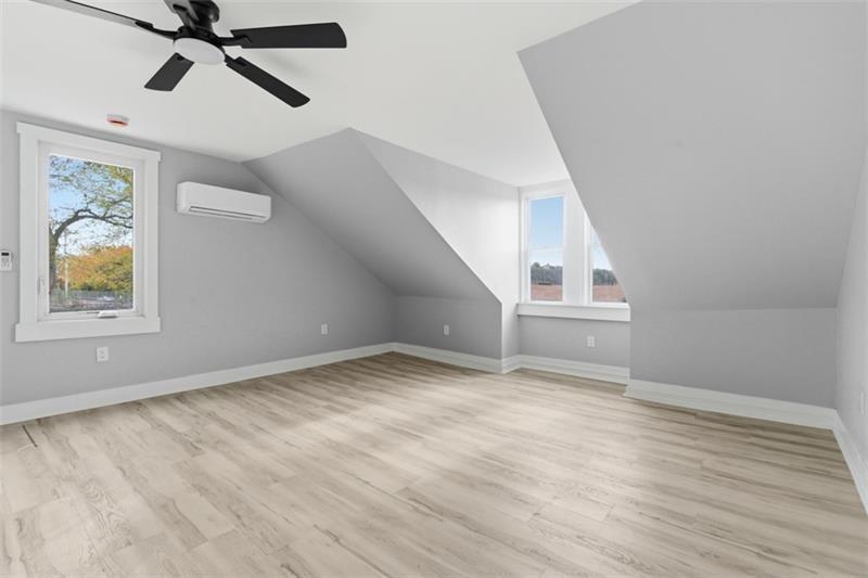 1150 Goettmann Street Pittsburgh, PA 15212 - Photo 29 of 36 a view of empty room with wooden floor and fan