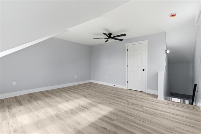 1150 Goettmann Street Pittsburgh, PA 15212 - Photo 31 of 36 a view of empty room with wooden floor